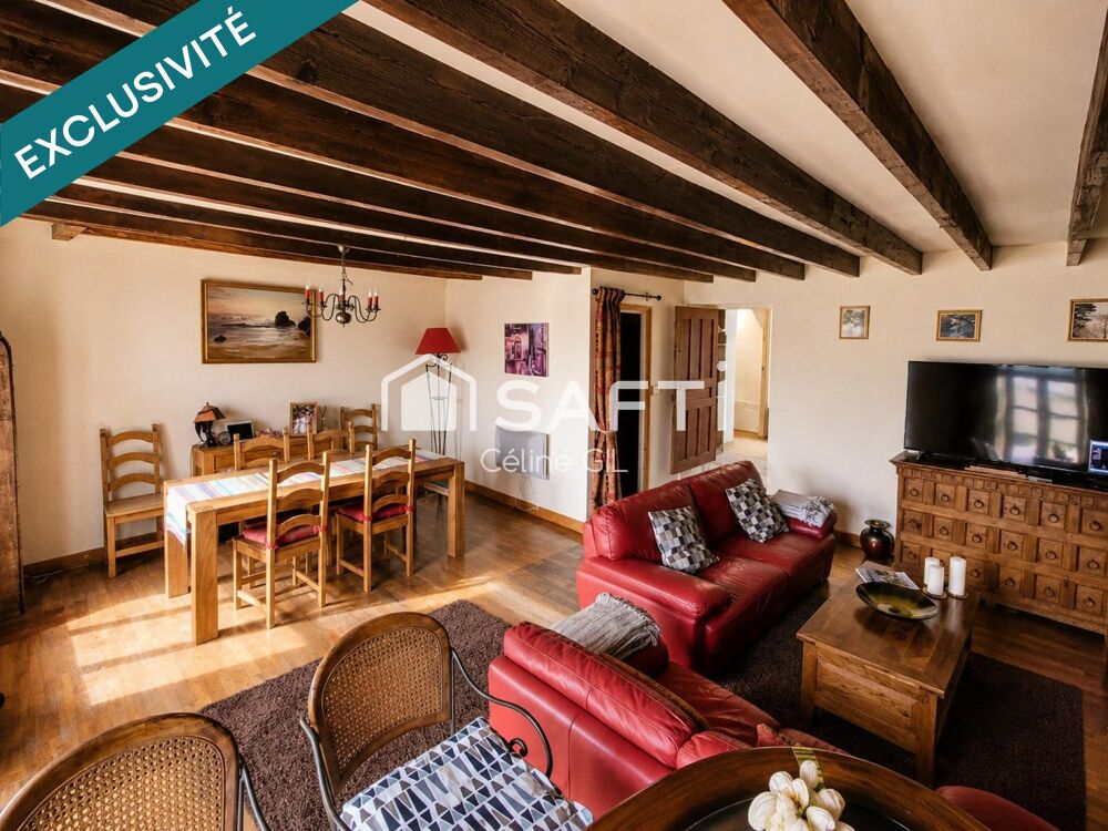 Belle maison mitoyenne au coeur du bourg