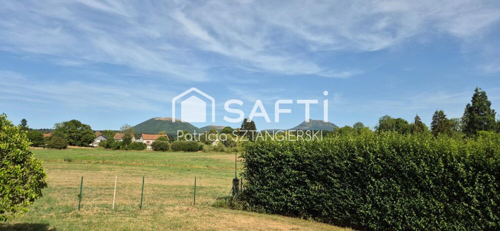 Mazaye (63230) maison ossature bois avec vue exceptionnelle sur la chaîne des Puys.