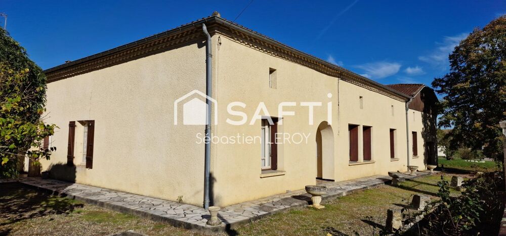 Grande maison familiale avec dépendances.