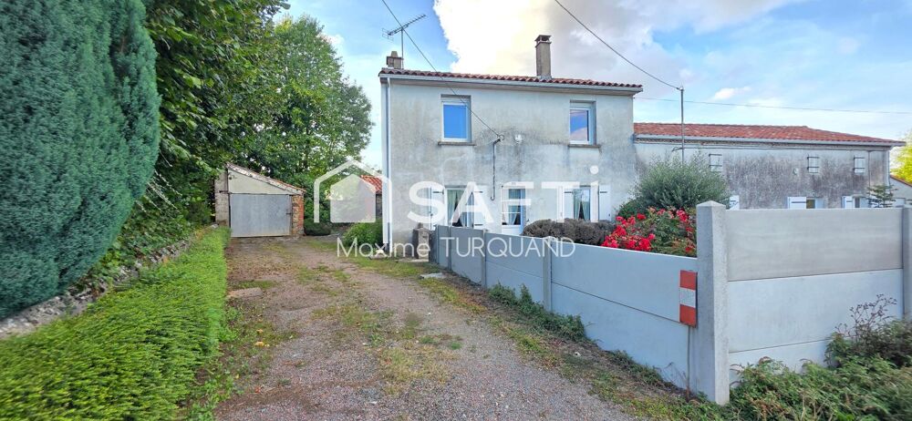 Vente Immeuble Ensemble immobilier comprenant 2 logements dont 1 loué + terrains + dépendances. Saint-mesmin