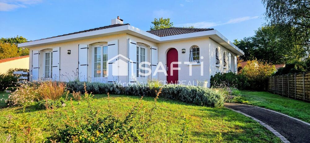 Maison familiale en parfait état de 134m² hab avec 4 chambres, bureau et grand garage sur terrain clos de 683m².