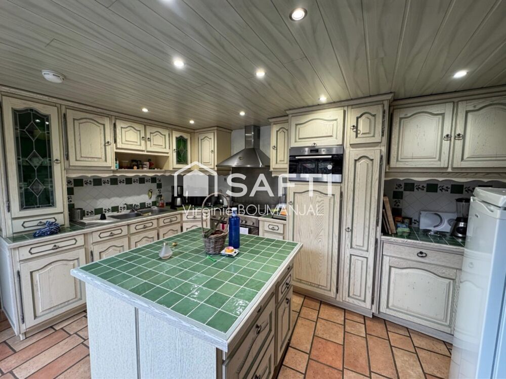 Maison de 130m2 3/4 chambres avec jardin clos et 2 garages