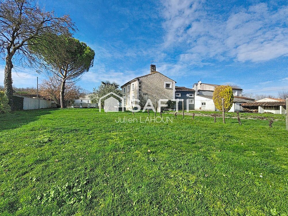 Maison en pierre avec piscine et garage