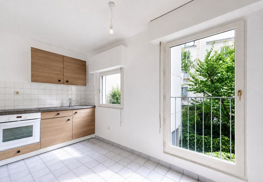 Vente Appartement AU PIED DU CANAL AVEC UNE VUE ARBOREE Paris 19