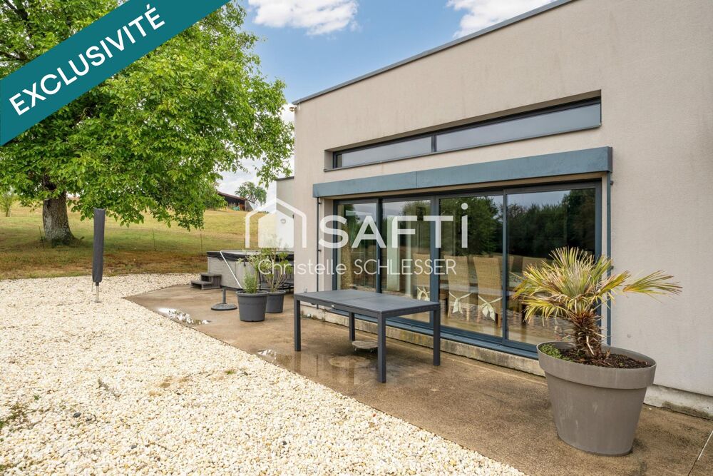 Coup de coeur assuré pour les amoureux de nature et de sérénité à Migneville avec cette maison d'architecte