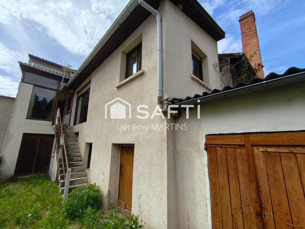 Maison de ville avec garage et jardin