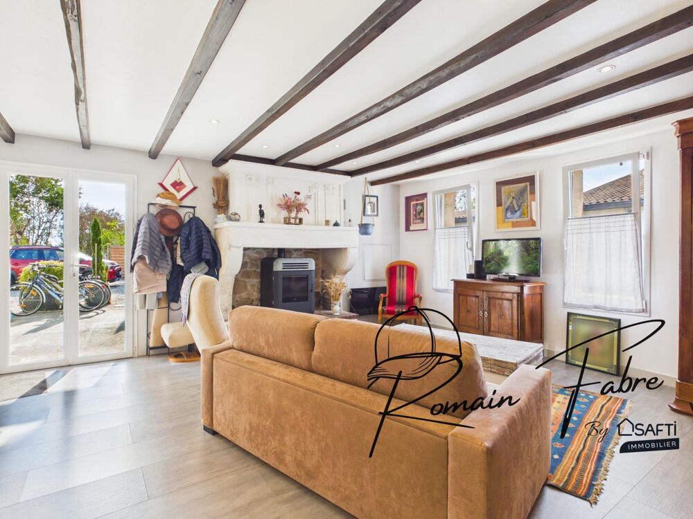 Vente Maison Maison en pierre de 131 m2 avec 3 chambres, grande terrasse couverte et arrière chai, au calme Laruscade