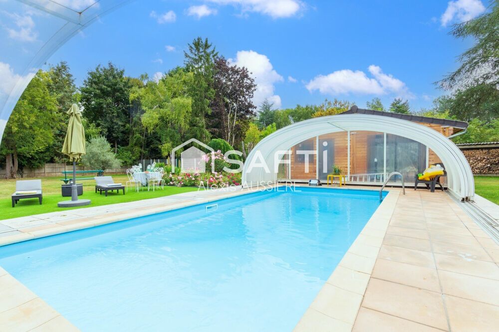 MAISON DE 385 M2 ET PARC ARBORE DE 4700 M2