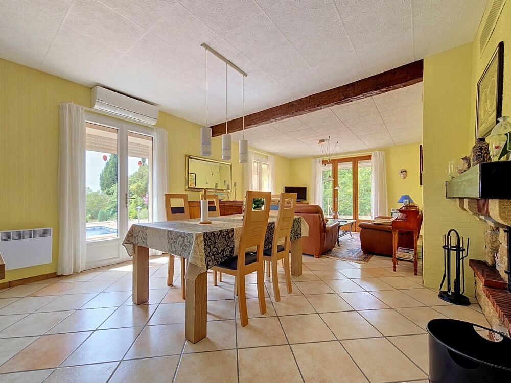 Vente Maison Une villa familiale de plain-pied au cœur d'un véritable écrin de verdure, sans vis-à-vis, dans un environnement privilégié. La tour-sur-orb