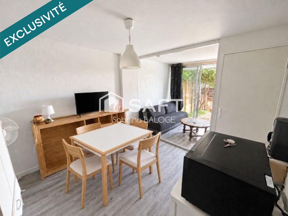 Appartement en rez-de-jardin avec belle terrasse