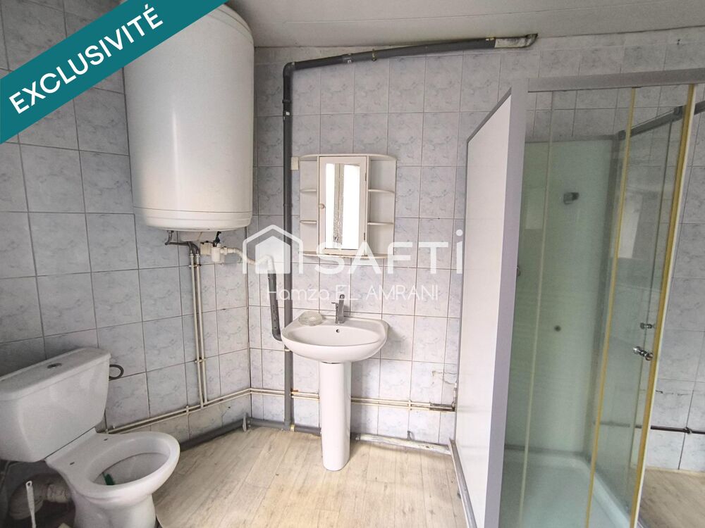 Immeuble de rapport en centre ville 2 appartements et un commerce