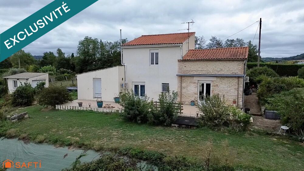 Maison familiale avec dépendances, vaste terrain et vue dégagée sur le Lot