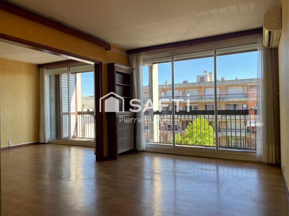 Appartement T5 rénové avec balcons et stationnement