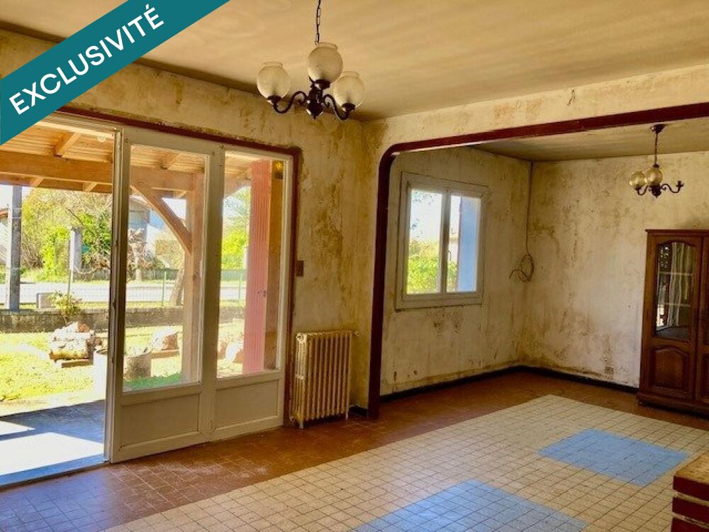 MAISON PLAIN PIED A RENOVER AVEC GARAGE ET JARDIN