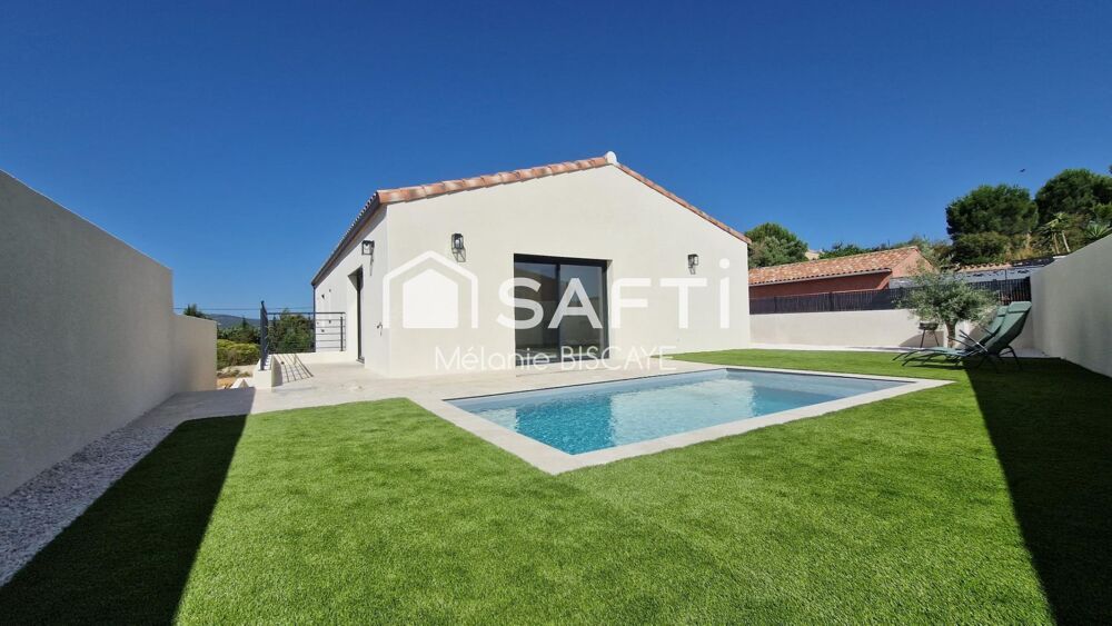 MAISON DE PLAIN PIED AVEC PISCINE GARAGE ET SOUS-SOL