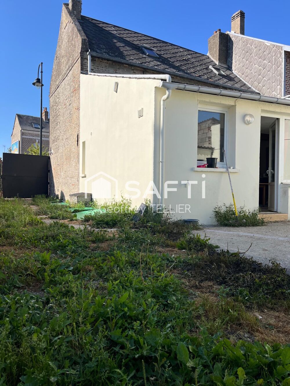 Maison avec terrain en ville