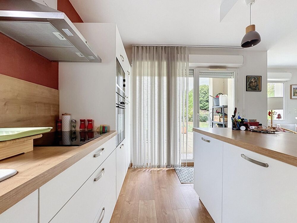 Appartement 2 chambres avec terrasse, jardin et garage fermé