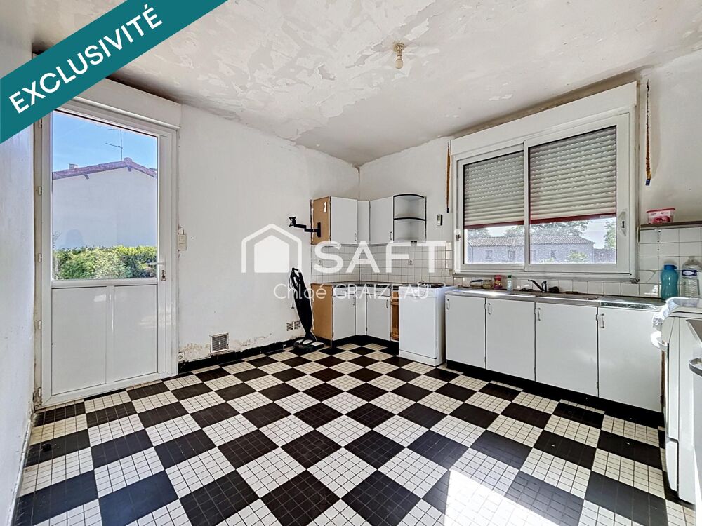 Maison sur demi-sous-sol, 84 m² habitables, terrain constructible
