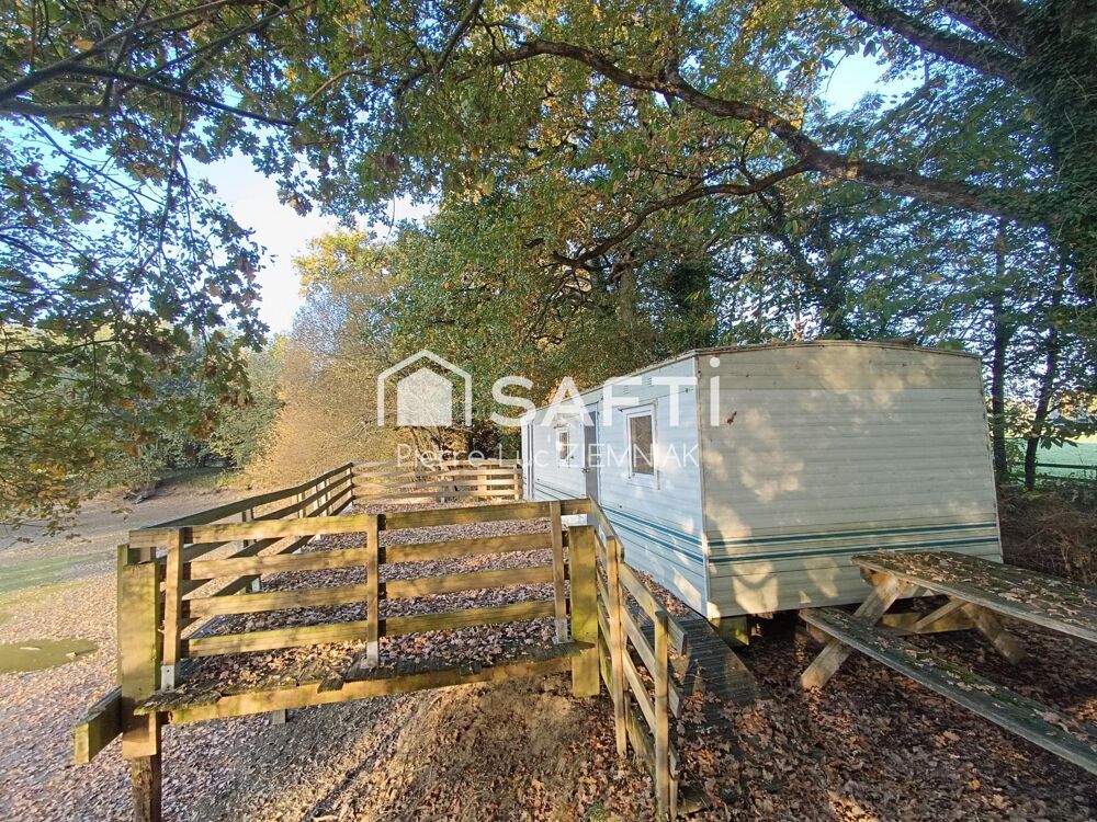 Vente Terrain Terrain de loisirs avec étang et mobil-home – 4100 m² clos à Houssay (53360) Houssay