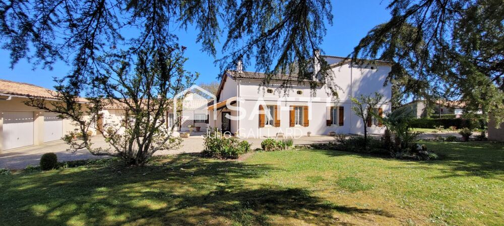 Maison en pierre sur un parc arboré de 4500 m2