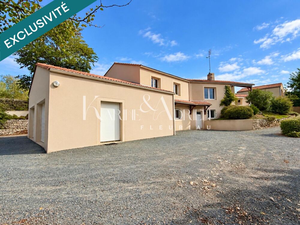 Maison contemporaine avec 5 chambres, bureau, parc arboré clos, dépendances et double garage