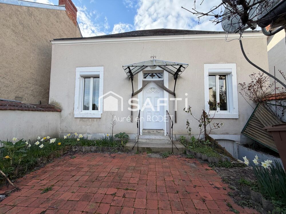 Maison de ville, quartier calme.
