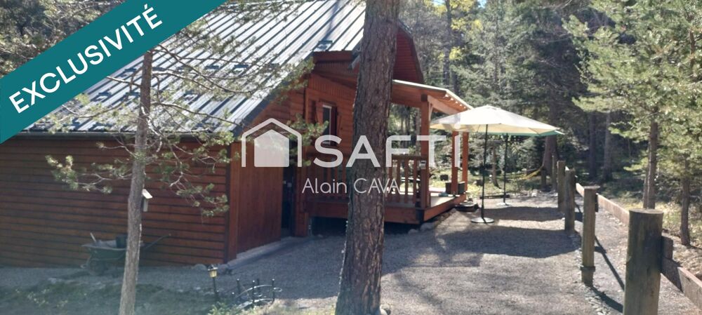 Chalet de 51m² sur 2 niveaux avec garages, vide sanitaire sur 552 m² de terrain cloturé
