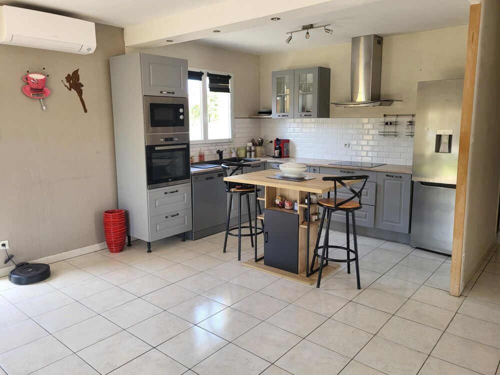 Maison plain pied avec garage et piscine