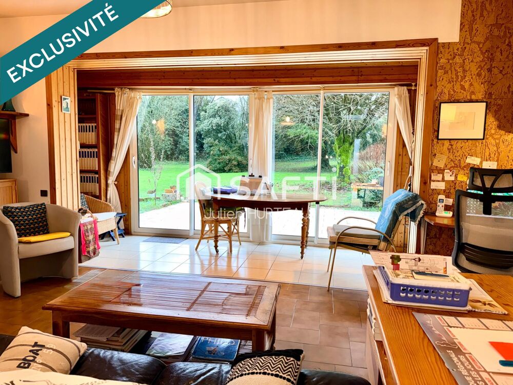 Maison de plain-pied 3 chambres, 2 garages et cave