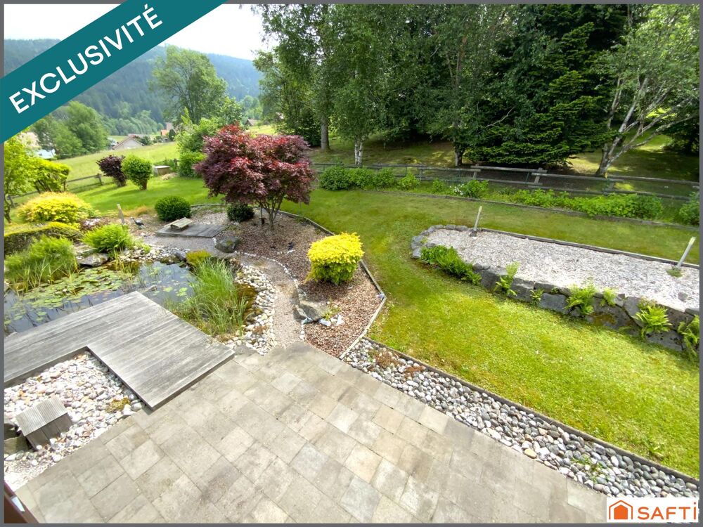 Chalet d'exception avec grand terrain paysagé de 2000 M2 , proximité des pistes et de la nature, emplacement rare.