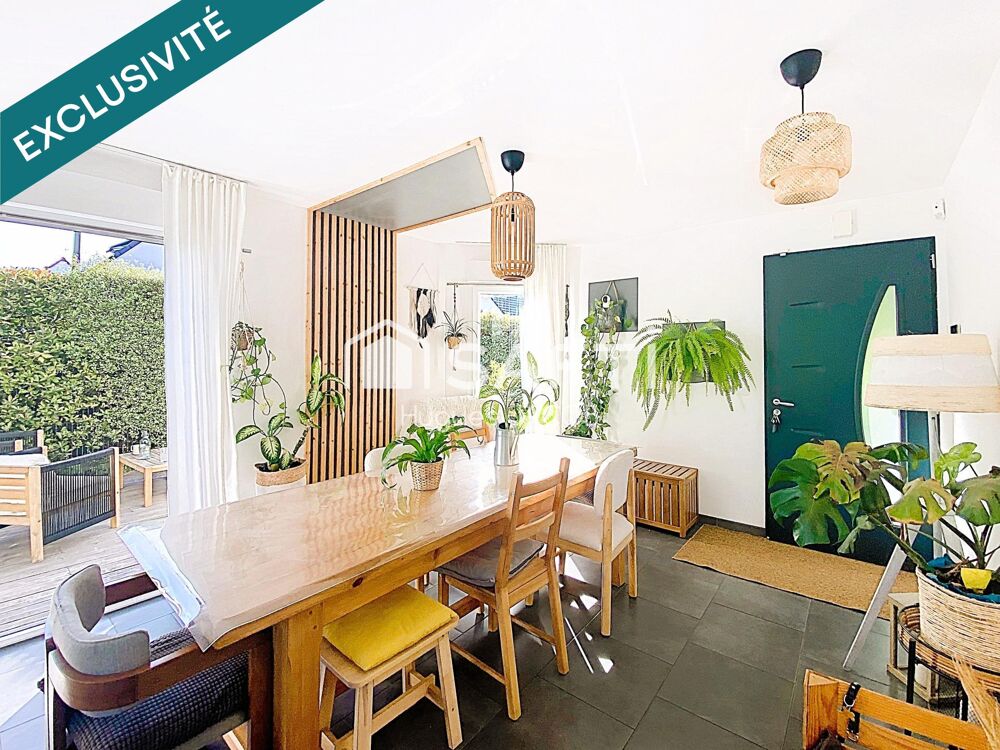 Maison récente de plain-pied avec 4 chambres, un jardin clos arboré et garage