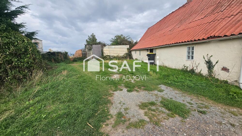 Avis aux amateurs de travaux! Une maison à fort potentiel sur un terrain 474 m² vous attend à Arnèke