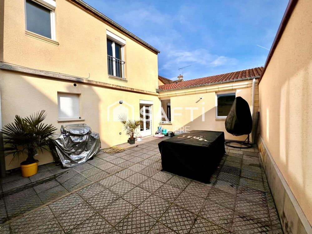 Maison de ville (2 beaux appartements;1 loué); terrasse.
