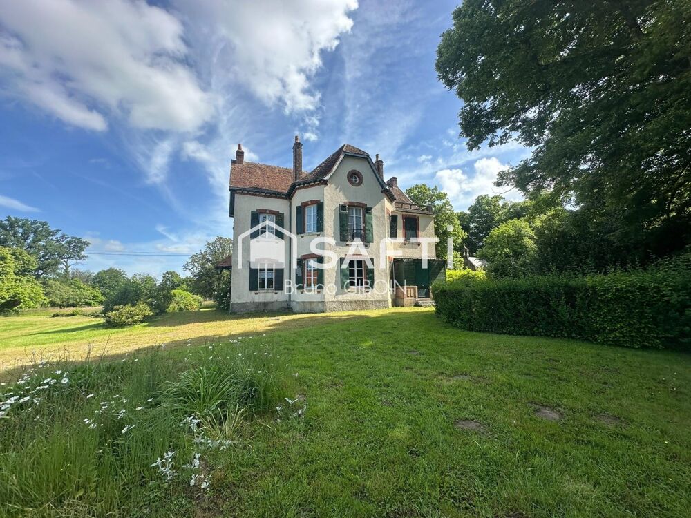 Maison de maître, 306 m²,12 pièces, 10 chambres, parc boisé.