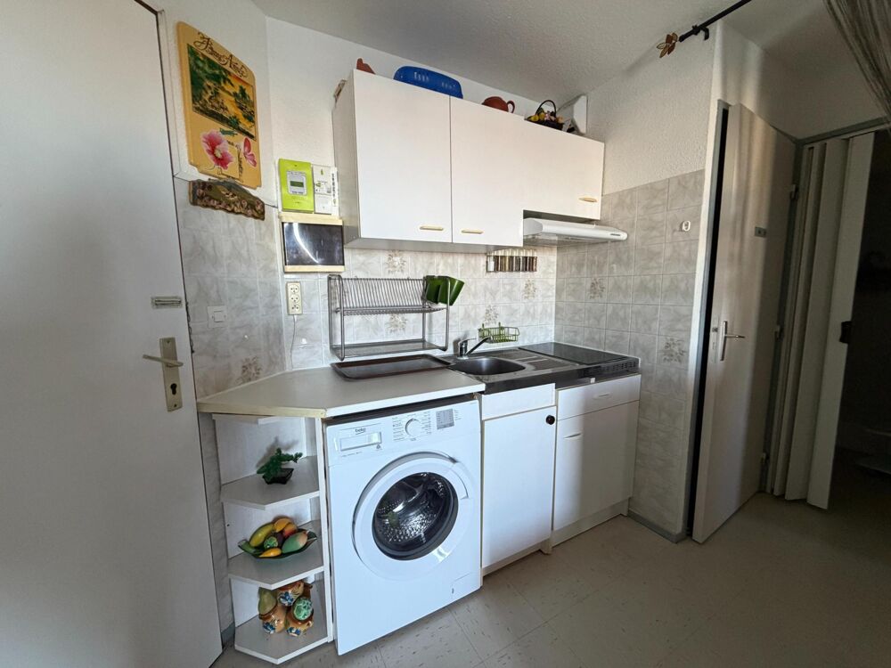 Appartement T2 avec loggia, parking et vue sur létang