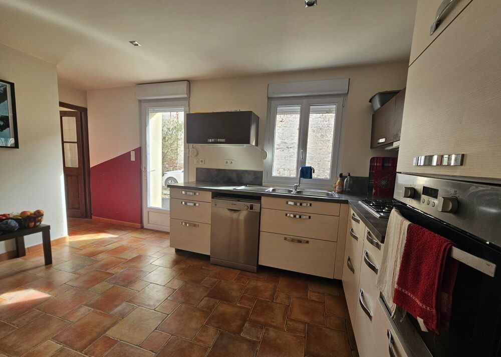 MAISON AVEC 6 CHAMBRES ET JARDIN EN CENTRE VILLE