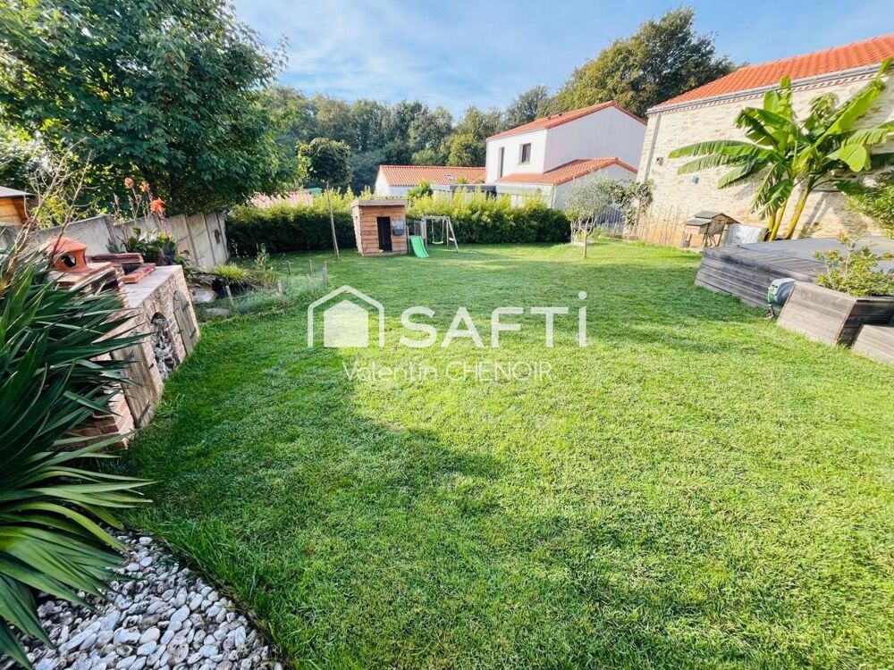 Vente Maison Longère 6 pièces rénovée avec authenticité et modernité en village à 10 minutes de Nantes Bouguenais