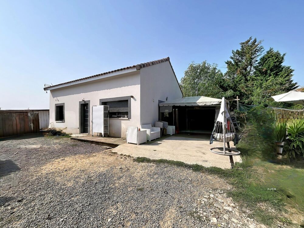 Ensemble immobilier - deux maisons louées sur un terrain 1 434m²
