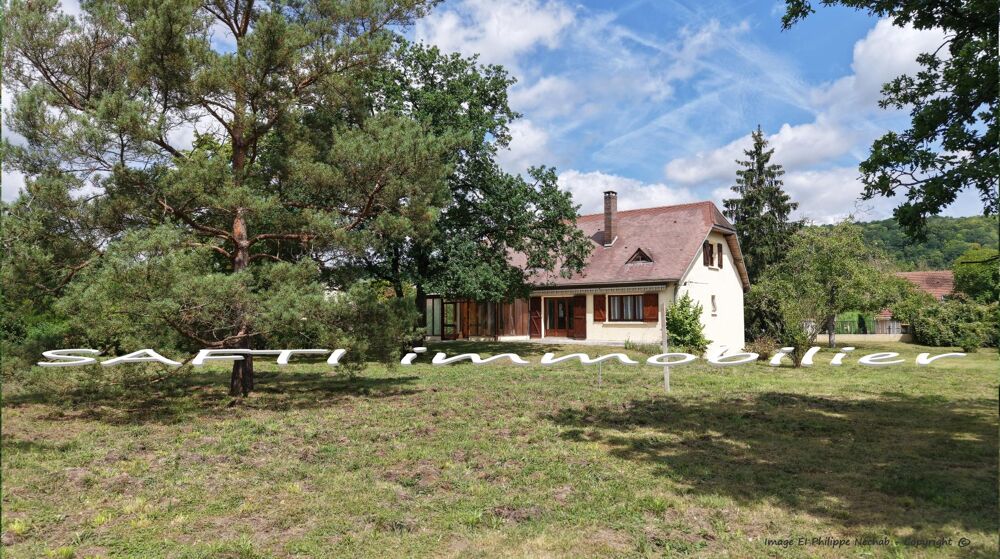Maison de 177m2 habitables - 4 chambres - terrain de 6600m2 autour + sous-sol total .