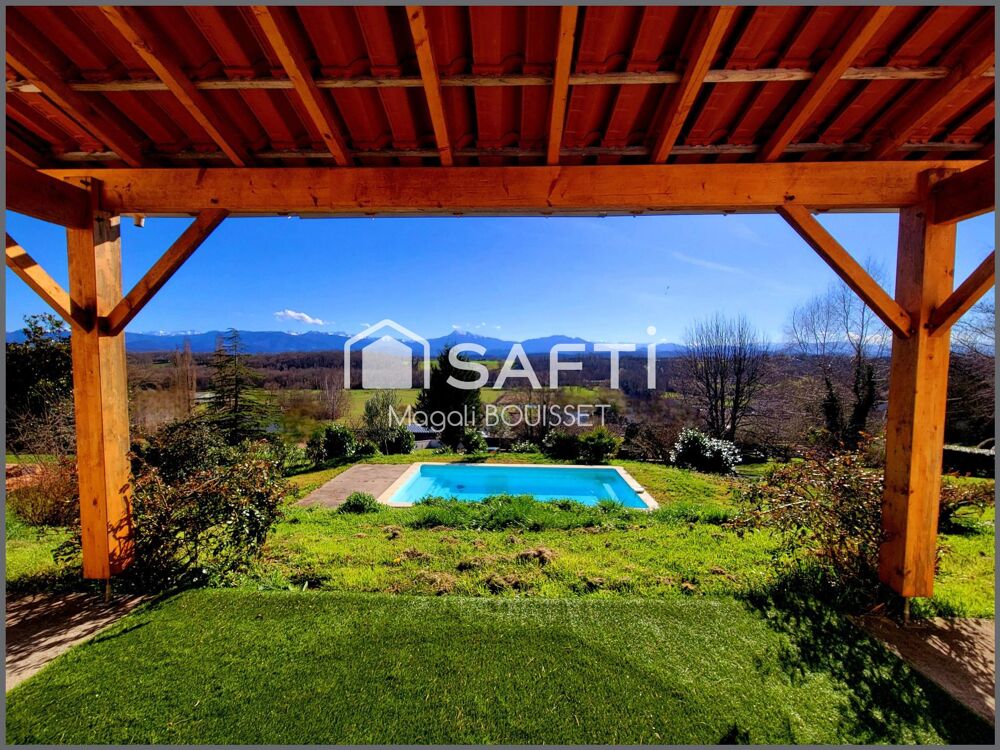Charmante Maison T6 de 179m², 5 chambres dont une suite parentale, piscine, terrasses, garages, jardin de 3446m². Finitions à pr