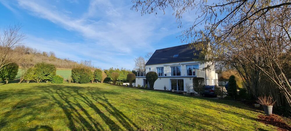 Superbe maison familiale avec jardin paysager bordé par un ru !
