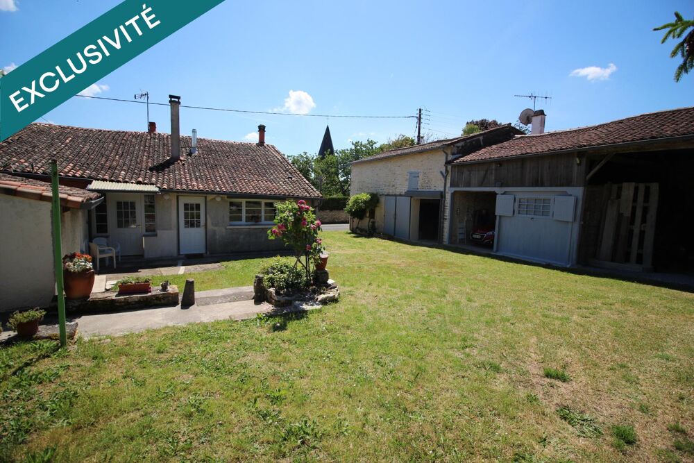 Maison 4 chambres prête à vivre , 2 garages et dépendances !