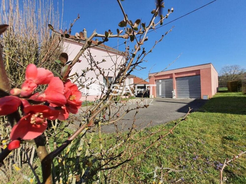 Maisons rénovées et un bâtiment à CARSPACH