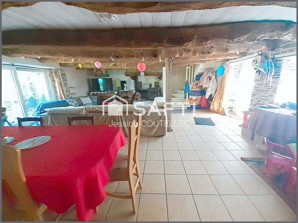 À seulement 10 minutes du centre de Ploërmel, découvrez cette longère pleine de charme dans un cadre privilégié !