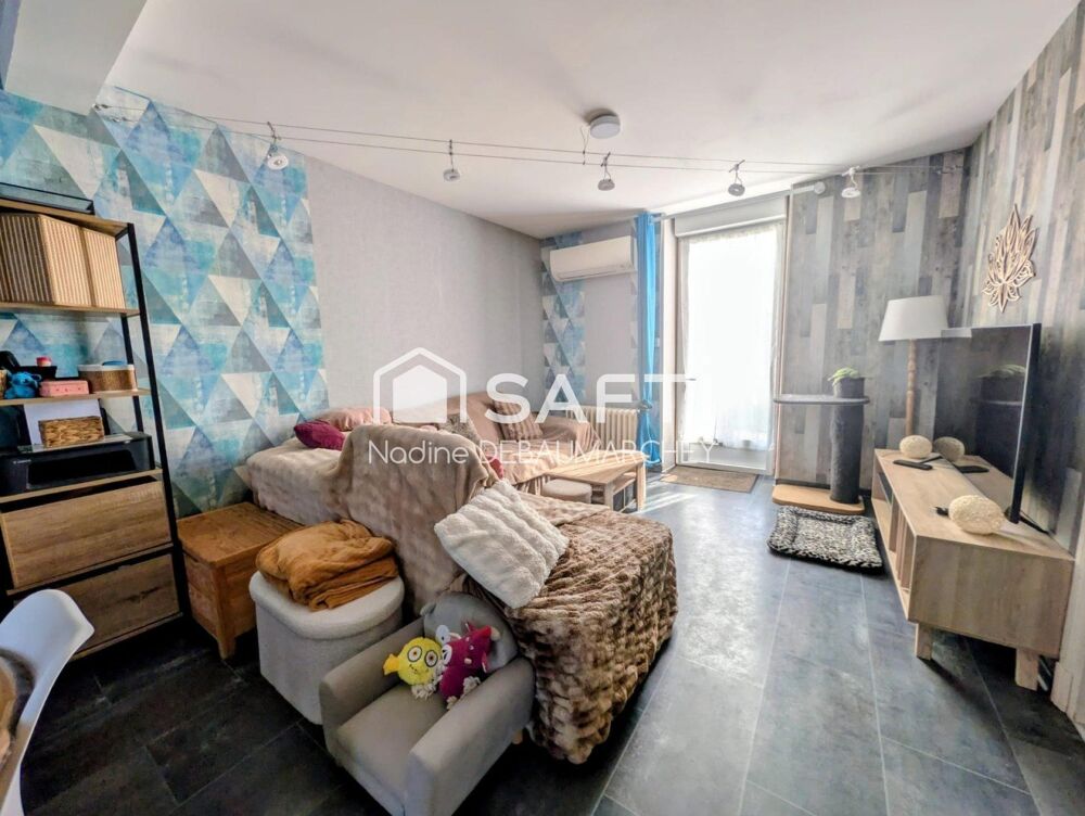 Vente Maison Le charme de la pierre et le confort du plain-pied à deux pas du bourg : découvrez cette maison rénovée de 89 m² avec jardin à P Palinges