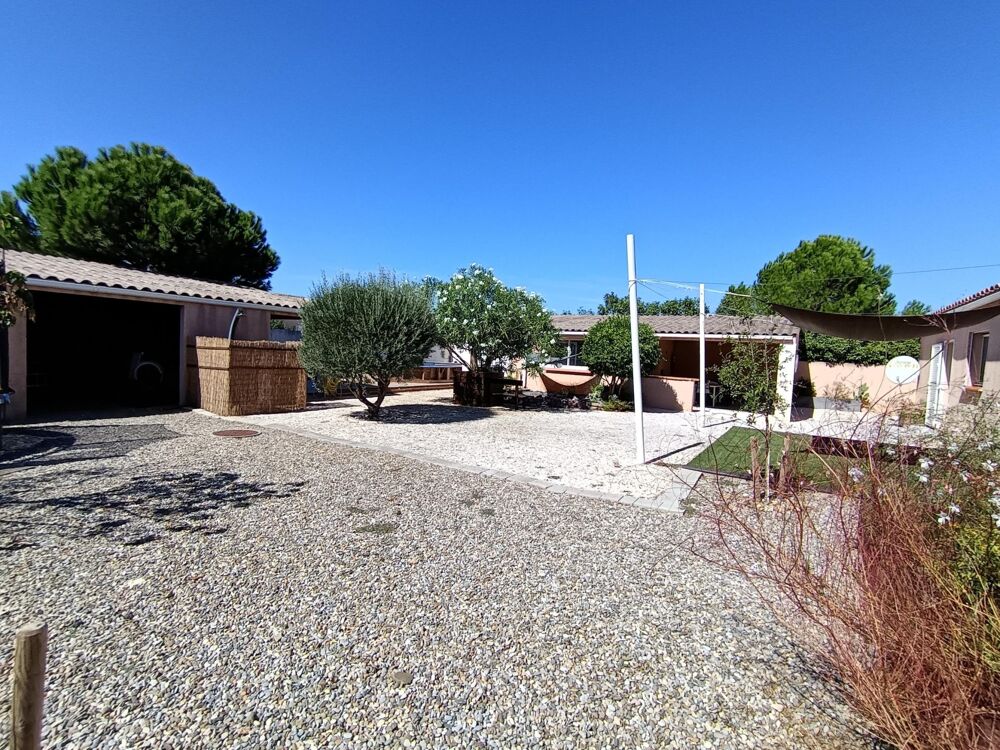 Vente Maison Villa 120m² 4 chambres sur terrain de 996m² avec piscine, double garage et cuisine d'été La redorte