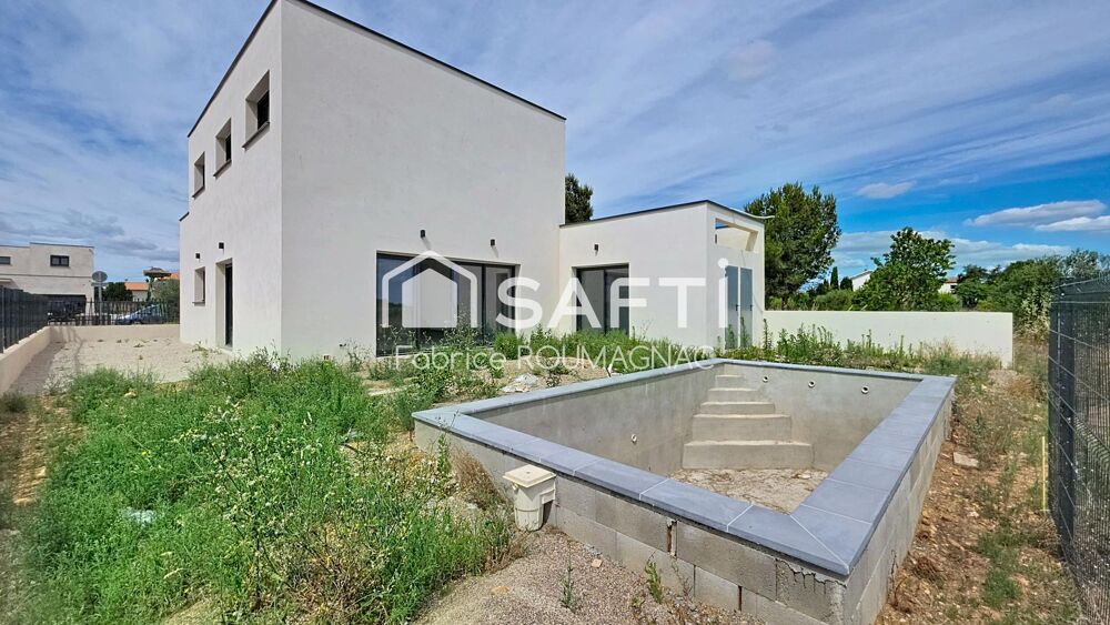 A Vendres villa de 148 m² quatre chambres, garage, piscine sur une parcelle de 627 m²
