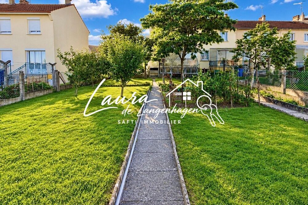 Maison de ville avec sous-sol complet et jardin