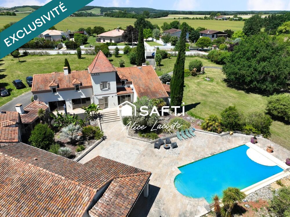 Propriété avec parc, piscine, tennis et étang