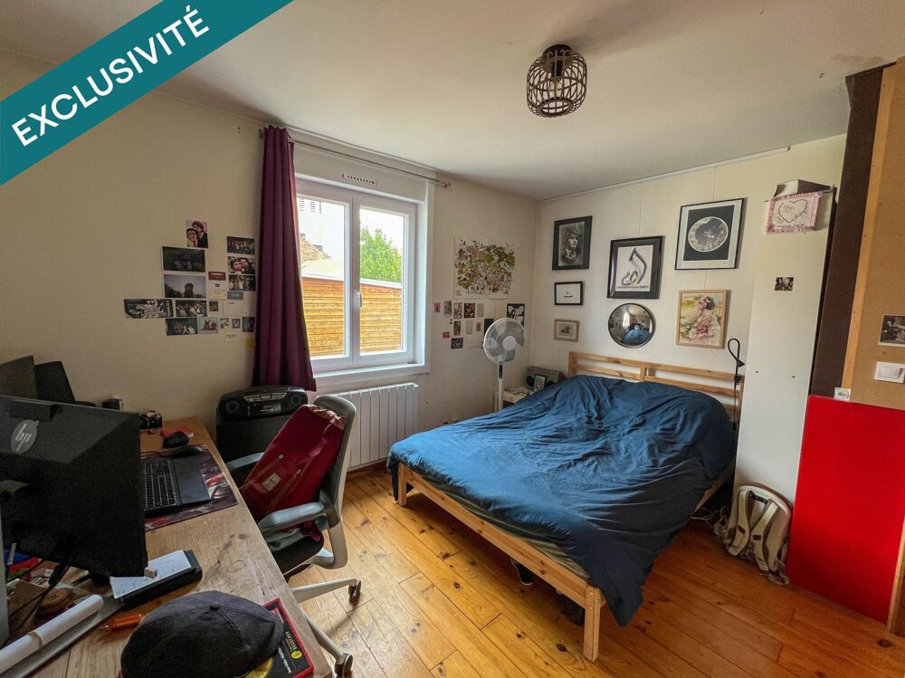 Jolie maison de courée de 43m² avec jardinet et cave.